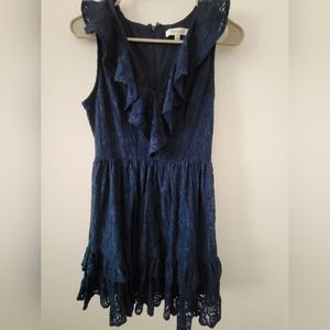 Francescas navy blue eyelet dress with ruffles.